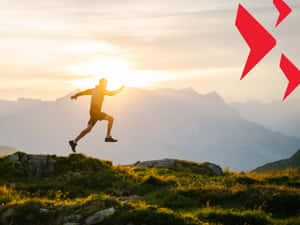 Resilient Man Running Above The Mountain Wallpaper