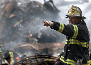 Resolute Deputy Fire Chief Commanding At Scene Wallpaper