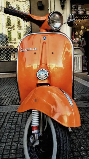Retro Aesthetic Orange Vespa 50 Wallpaper