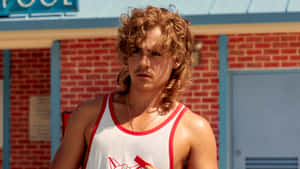 Retro Athletic Young Man Outdoors Wallpaper