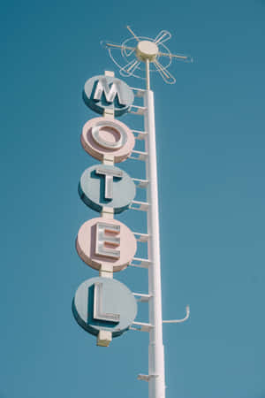 Retro Motel Sign Vertical View Wallpaper