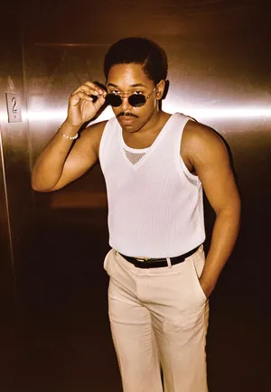 Retro Style Man In Elevator.jpg Wallpaper