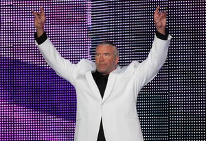 Retrospective Portrait Of Wwe Hall Of Famer Scott Hall Wallpaper