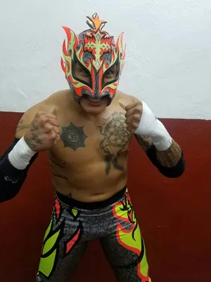 Rey Fenix Professional Wrestler Posing At The Camera Wallpaper