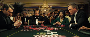 Rich People Playing On Poker Table Wallpaper