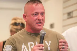 Richard Ojeda Holding A Microphone Wallpaper