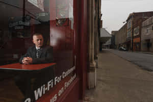 Richard Ojeda Looking Out From Window Wallpaper