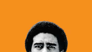 Richard Pryor Mesmerizing The Audience With His Stellar Performance Wallpaper