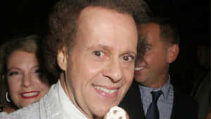 Richard Simmons Smilingat Event Wallpaper