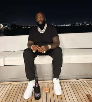 Rick Ross Nighttime Yacht Scene Wallpaper