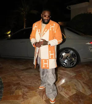 Rick Ross Stylish Outdoor Look Wallpaper