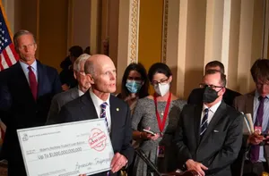 Rick Scott Criticizes Biden's Student Loan Cancellation Wallpaper