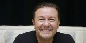 Ricky Gervais In His Iconic Role As David Brent From The Office Wallpaper