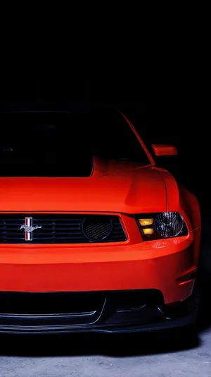 Ride In Style With A Red Car Iphone Wallpaper
