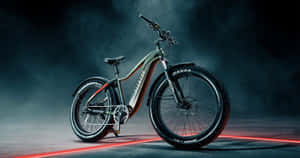 Riding Into The Future: Electric Bike On The Road Wallpaper