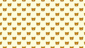 Rilakkuma Sitting Comfortably On A Laptop Wallpaper