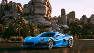 Rimac Automobili Electric Hypercar On The Move Wallpaper