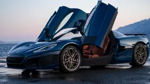 Rimac Automobili High-performance Electric Car On Urban Streets Wallpaper