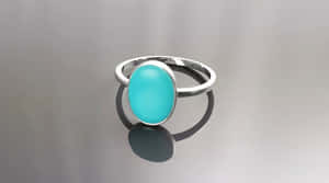 Ring With Bright Blue Oval Stone Wallpaper