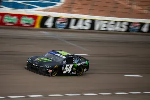 Rising Star Ty Gibbs Dominating The Race Track Wallpaper