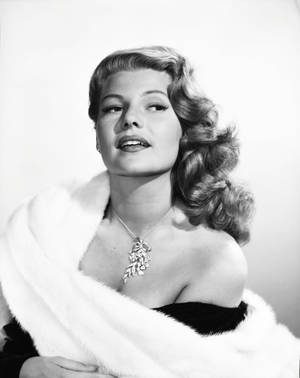 Rita Hayworth – The Epitome Of Hollywood Glamour Wallpaper