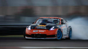 Roar On The Road With The Nissan 350z Wallpaper