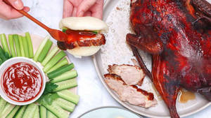 Roasted Peking Duck On A Bao Bun Wallpaper