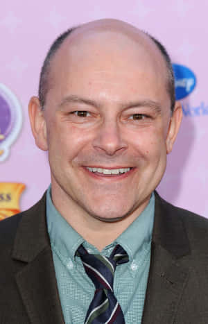 Rob Corddry Poses In An Ice-blue Suit Wallpaper