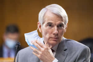 Rob Portman Removing Mask Wallpaper