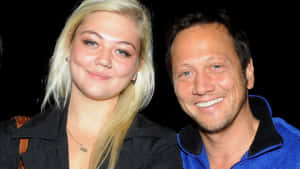 Rob Schneider With His Daughter Elle King At A Red-carpet Event. Wallpaper
