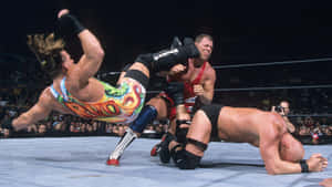 Rob Van Dam Kicking Kurt Angle Wallpaper