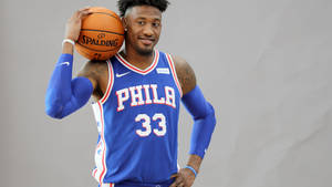 Robert Covington Wears Philadelphia Blue Jersey Wallpaper