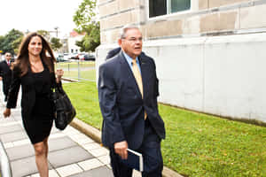 Robert Menendez Walking To Trial Wallpaper