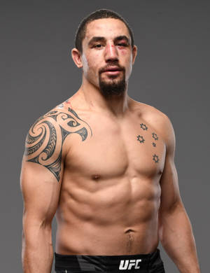 Robert Whittaker In Gray Background Wallpaper