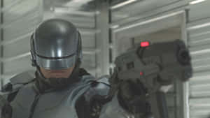 Robocop Pointing Gun Wallpaper