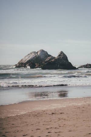 Rock Formations Near Beach Android Wallpaper