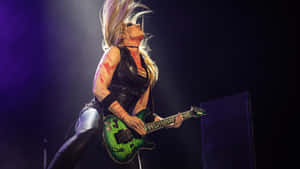 Rock Guitarist Performance Energy Wallpaper