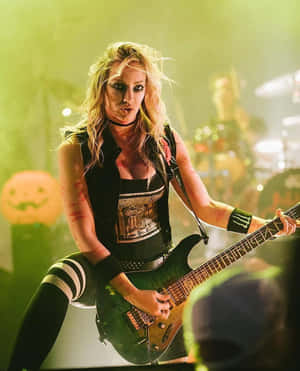Rock Guitarist Performance Halloween Theme Wallpaper