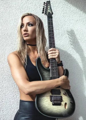 Rock_ Guitarist_with_ Electric_ Guitar Wallpaper