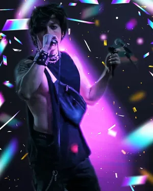 Rock Performancein Neon Lights Wallpaper