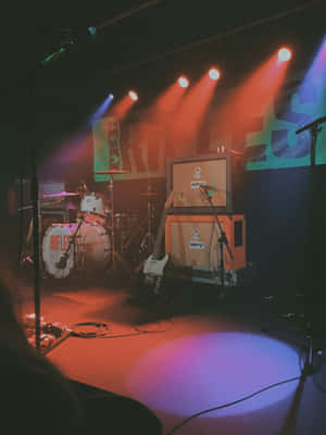 Rock Stage Setup_ Band Equipment_ Backlit Wallpaper