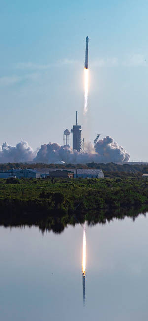 Rocket With Cloud Of Smoke Wallpaper