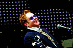 Rocketman Laughing During Performance Wallpaper