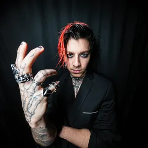 Rockstar Portraitwith Red Hair Streak Wallpaper