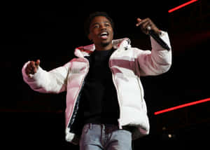 Roddy Ricch Performing Live On Stage Wallpaper