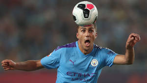 Rodri Hitting Soccer Ball Wallpaper