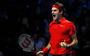 Roger Federer - The Swiss Maestro On The Tennis Court Wallpaper