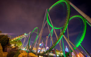 Roller Coaster With High Arching Loops Wallpaper