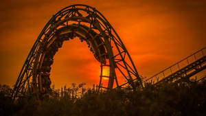Roller Coaster With Sunset Clouds Wallpaper