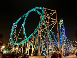 Roller Coaster With Teal Light Wallpaper